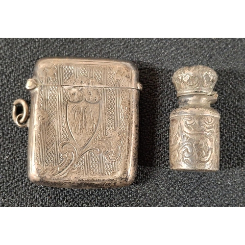 18 - Nicely engraved antique Birmingham vesta case together with a charming, tiny, unmarked, engraved sil... 