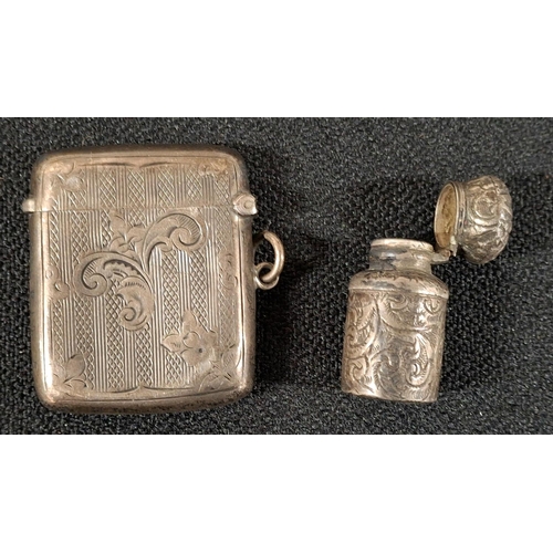 18 - Nicely engraved antique Birmingham vesta case together with a charming, tiny, unmarked, engraved sil... 