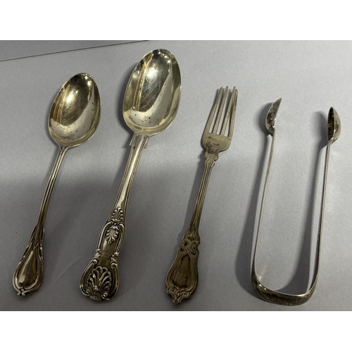 28 - Two hallmarked silver spoons together with a fork and Victorian 1852 London sugar nips (4) 

160 gra... 