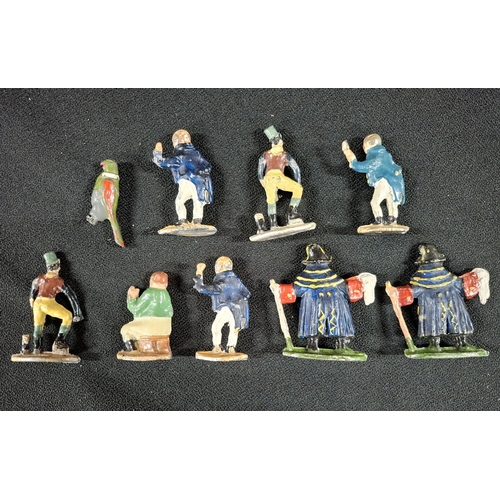 114 - Small quantity of antique cold painted lead figures and a similar Parrot