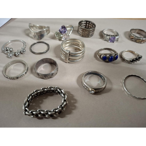 51 - Collection of 20 silver rings, the vast majority stamped 925 or silver etc including an interesting ... 