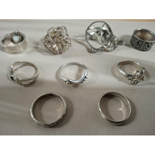 55 - Collection of 15 silver rings, the vast majority stamped 925 or silver etc (15),

63 grams