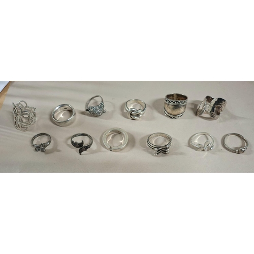 56 - Collection of 12 silver rings, the vast majority stamped 925 or silver etc (12),

67 grams