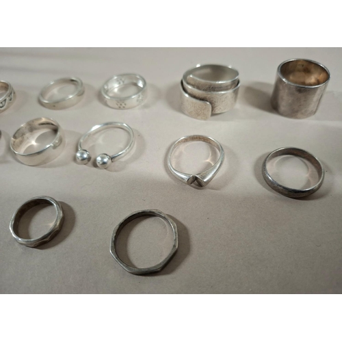 57 - Collection of 15 silver rings, the vast majority stamped 925 or silver etc (15),

52 grams