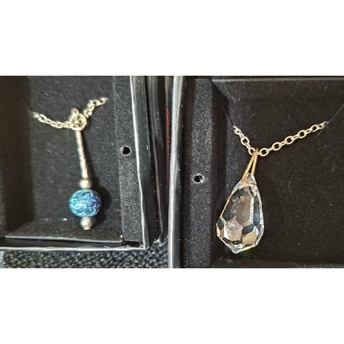 71 - Three 925 silver chains with a Mother of Pearl leaf pendant, a faceted teardrop pendant and a blue b... 