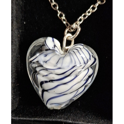 72 - Three 925 silver chains with a crystal Angel pendant, a Murano style glass heart pendant and a blue ... 