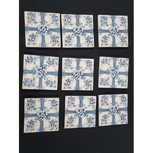 242 - Nine ceramic tiles (9)