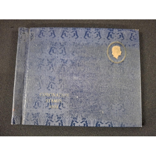 359 - Official QEII coronation album by Stanley Gibbons and G F Rapkin Ltd to include GB and many Commonwe... 