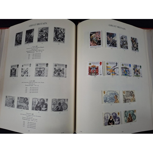 366 - Red Stanley Gibbons album containing GB QEII commemoratives, mint 1971-1980 and 1982-1992 used, virt... 