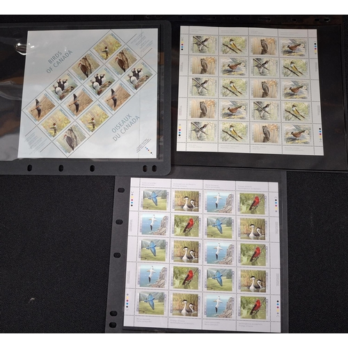 369 - Three complete, mint unmounted sheets of 1980s 