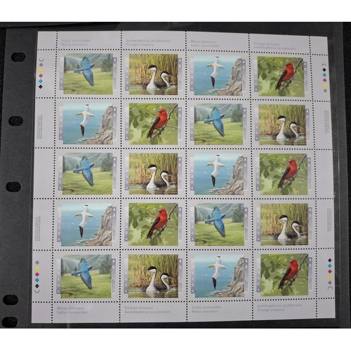 369 - Three complete, mint unmounted sheets of 1980s 