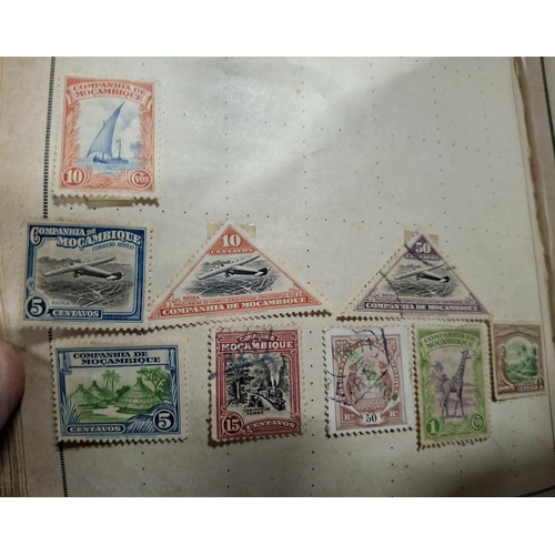 390 - Two old stamp albums to include world stamps, mainly used examples, 7 early 2000s stamp packs etc (Q... 