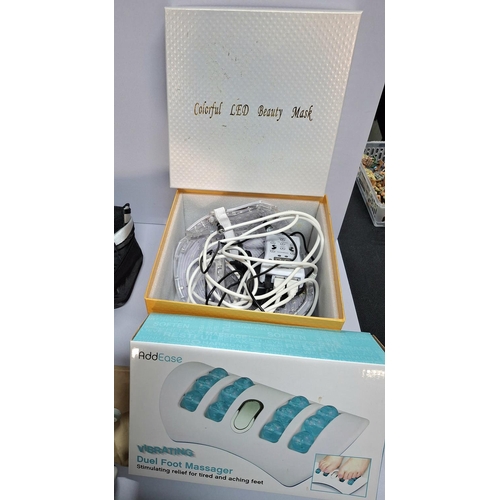 341 - Box of ladies electric beauty aids such as LED face mask & duel foot massager etc (Qty)