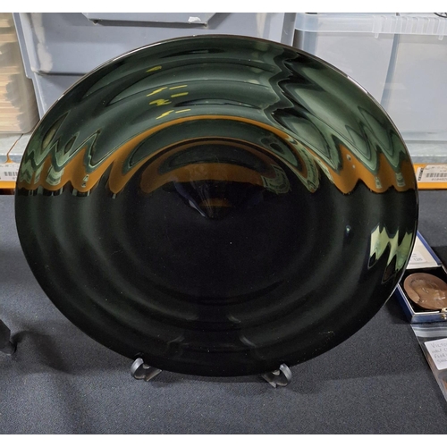 451 - Whitefriars dark glass charger,

37cm in diameter