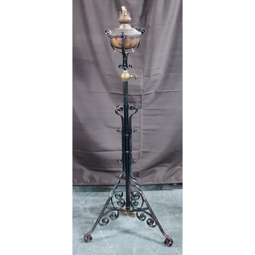 510 - Art Nouveau iron and brass rise and fall lamp