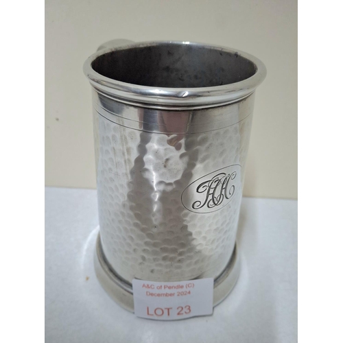 23 - Hand hammered pewter tankard with etched glass base for the 