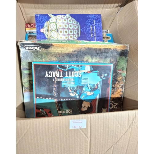 52 - Large box full of jigsaw puzzles