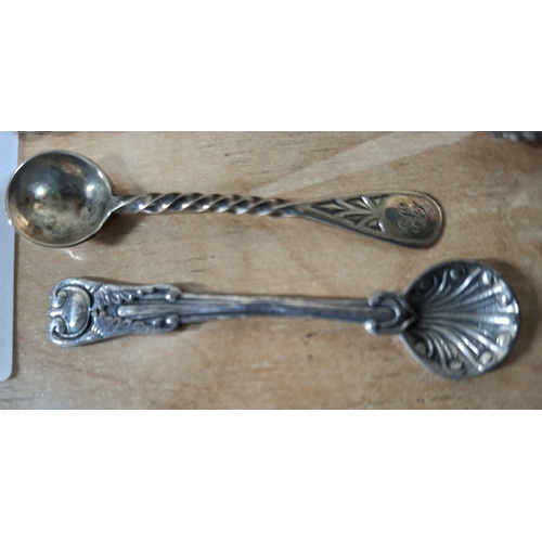 97 - Four various antique condiment spoons, one marked sterling, another for London 1884 and a pair of un... 