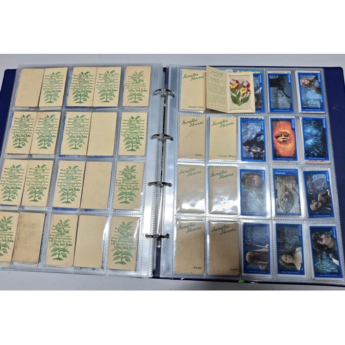 194 - Blue folder containing a large quantity (approx 35 pages) of 20thC cigarette and tea cards including... 