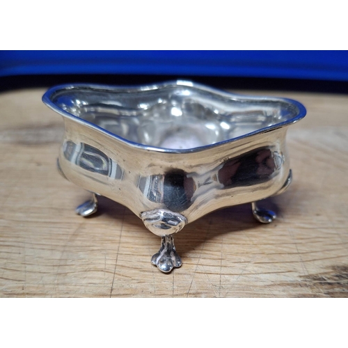 10 - Sheffield silver 1904 hallmarked 4-footed small salt bowl in classical form,

Approx 28 grams