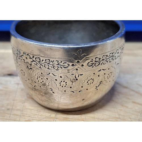 14 - Fine quality unmarked silver small bowl with engraved scrolling decoration,

28 grams