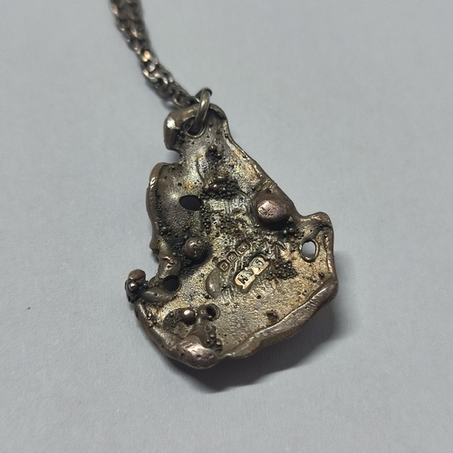 28 - Hallmarked Silver pendant on an 835 Silver chain, 
7.2 grams