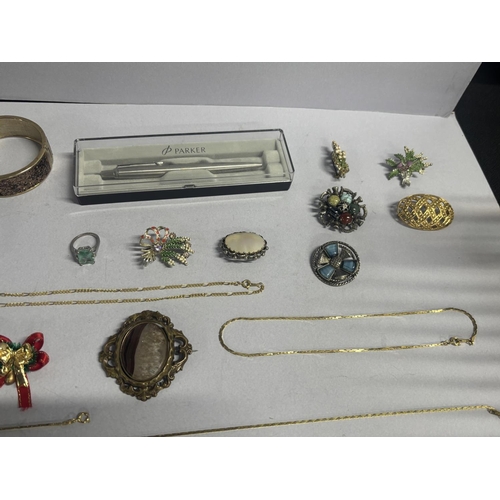 27 - Collection of costume jewlerey including chains, bangles, brooches and a Parker pen