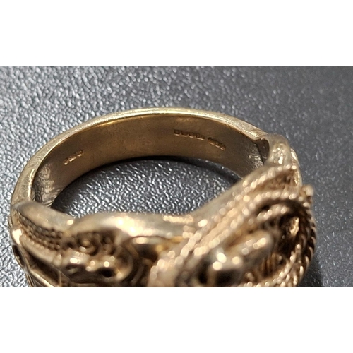 46 - Heavy, ornate fully hallmarked gents 9ct yellow gold ring,

20 grams