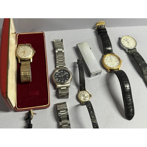 77 - Seven various wrist watches including a boxed Rotary watch and a vintage lighter (8)