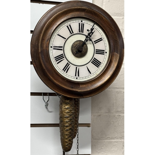 119 - Wall clock with acorn weights