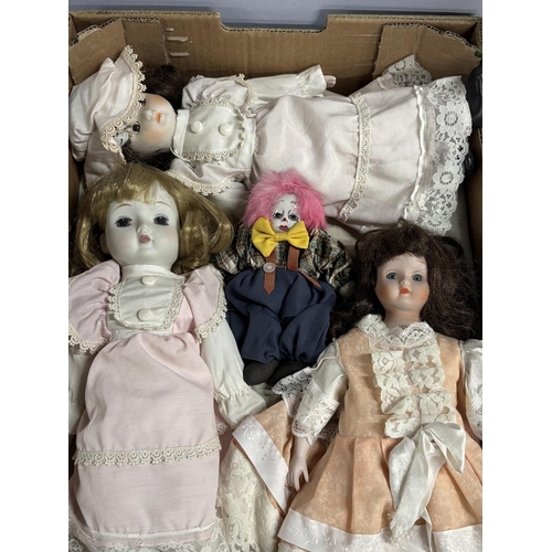 121 - 4 Ceramic dolls all appear to be in fine condition with a bottle (5)