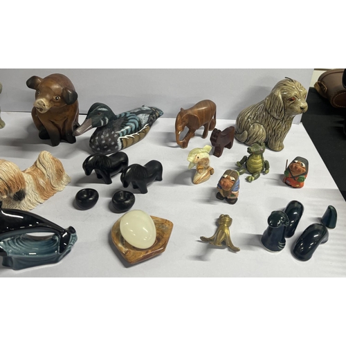 134 - Colection of Animals including cermaics and wood, 2 Dog candles and Wooden Pig