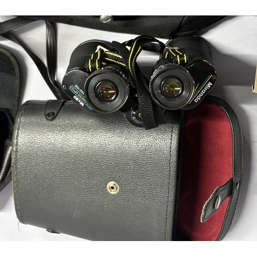 136 - Three sets of Binoculars including 2 cased Miranda, Gold Coated Optics 16x50 with small scope and so... 