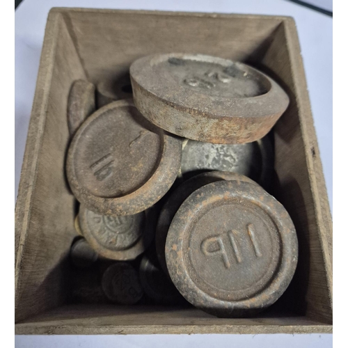 172 - Wooden box containing a collection of old large weights