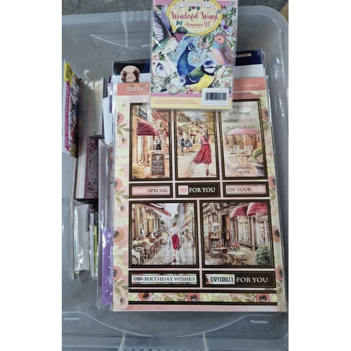 193 - Two boxes of various, new, unopened cards, together with a box full of still packaged small plastic ... 