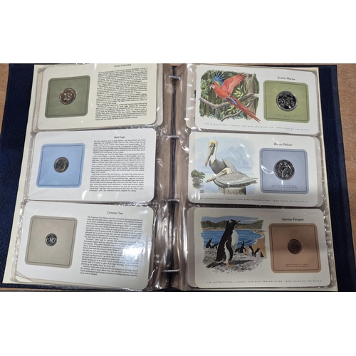 198 - The International council for bird preservation containing cards for many birds each with a coin fro... 