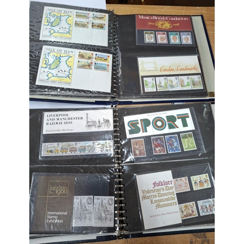 253 - Three albums containing mainly 1990s stamp packs and related FDCs, approx 80 stamp packs (Qty)