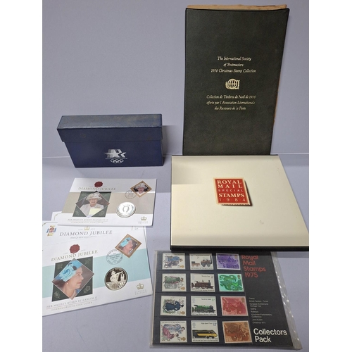 254 - Quantity of stamps to include The International Society of Postmasters 1976 Christmas stamp collecti... 