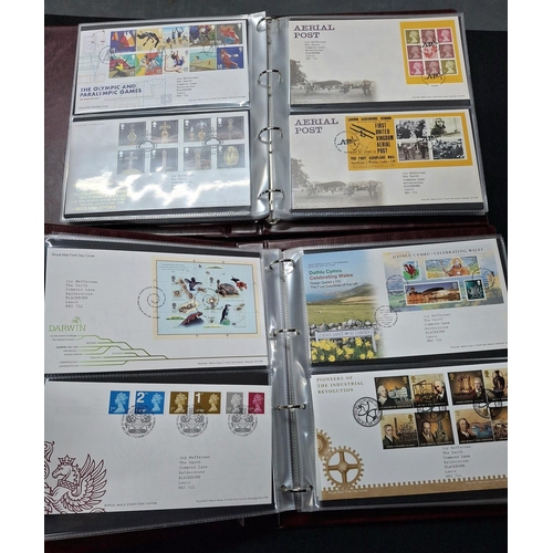 256 - Nine official Royal Mail FDC albums containing GB FDC 1980s-2011 not complete but huge amount