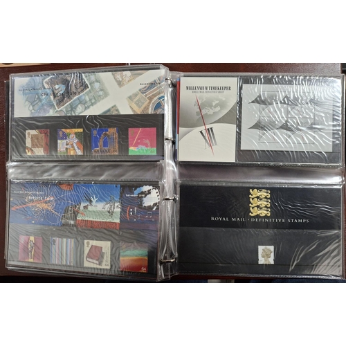 260 - Brown Royal Mail album containing approx 40 1999-2000 GB stamp packs (approx 40)