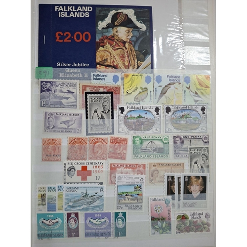 262 - Blue album containing Guernsey and Falkland Islands and dependencies including the sets of KGVI Falk... 