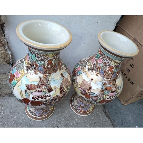 369 - Large pair of late Taisho period (1912-1926) Japanese Satsuma vases (2),

Both approx 45cm tall