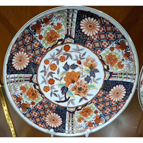 403 - Two 20thC Chinese Satsuma display plates with faux Qing dynasty marks to underside (2)