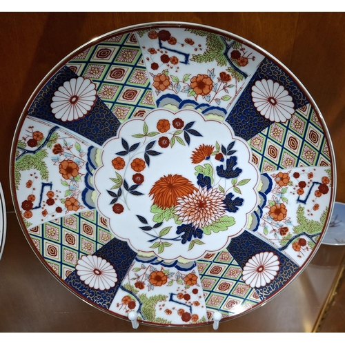 403 - Two 20thC Chinese Satsuma display plates with faux Qing dynasty marks to underside (2)