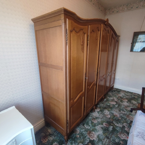 438 - Large Belgian light Oak wardrobe with four keys, dimensions approx. L-260 x H-200 x W-58cm