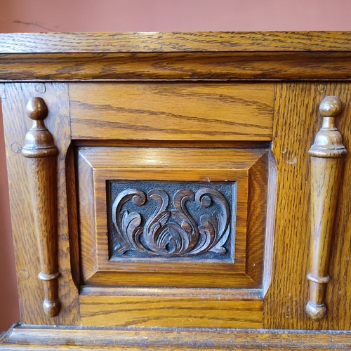 440 - Fine quality antique sideboard with hand-carved top-piece and inner drawers