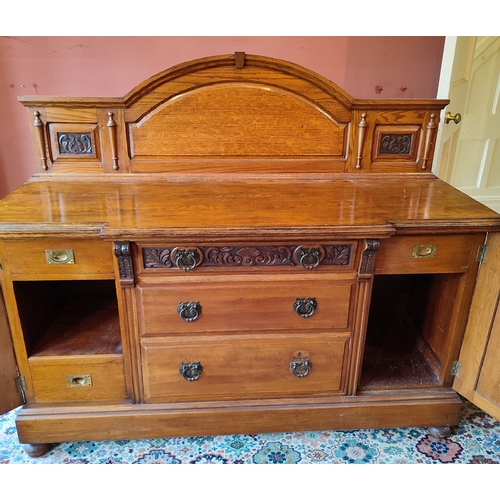 440 - Fine quality antique sideboard with hand-carved top-piece and inner drawers