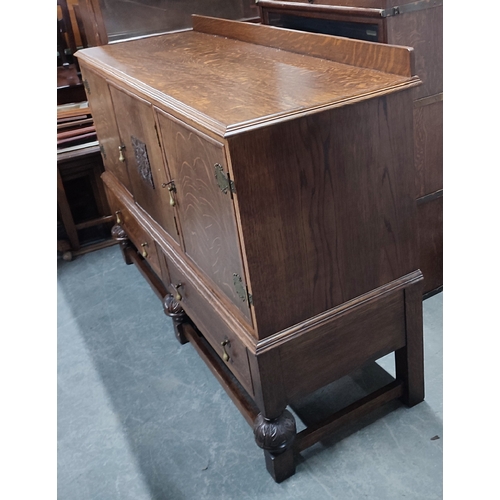 473 - Waring & Gillow, fine quality Oak buffet presented with brass handles and escutcheons, wth key and p... 