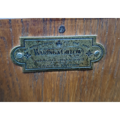 473 - Waring & Gillow, fine quality Oak buffet presented with brass handles and escutcheons, wth key and p... 