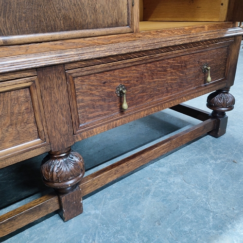 473 - Waring & Gillow, fine quality Oak buffet presented with brass handles and escutcheons, wth key and p... 